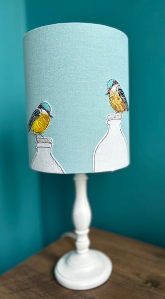 Lampshade - "Breakfast."  Embroidered blue tit birds perched on milk bottles