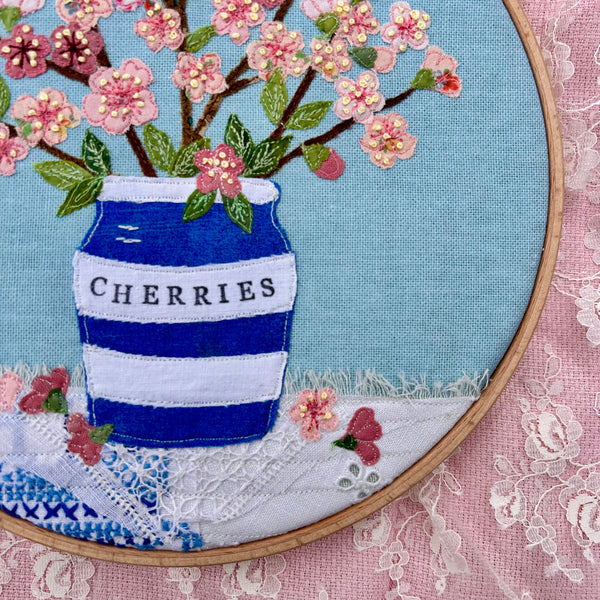 Hooped Picture - Embroidered cherry blossom in a cherry herb pot.