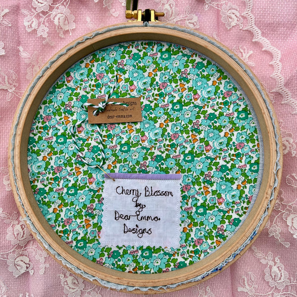 Hooped Picture - Embroidered cherry blossom in a cherry herb pot.